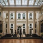 Economist speaking at a podium about healthcare funding.