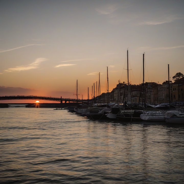 Person editing video on computer with editing software interface visible